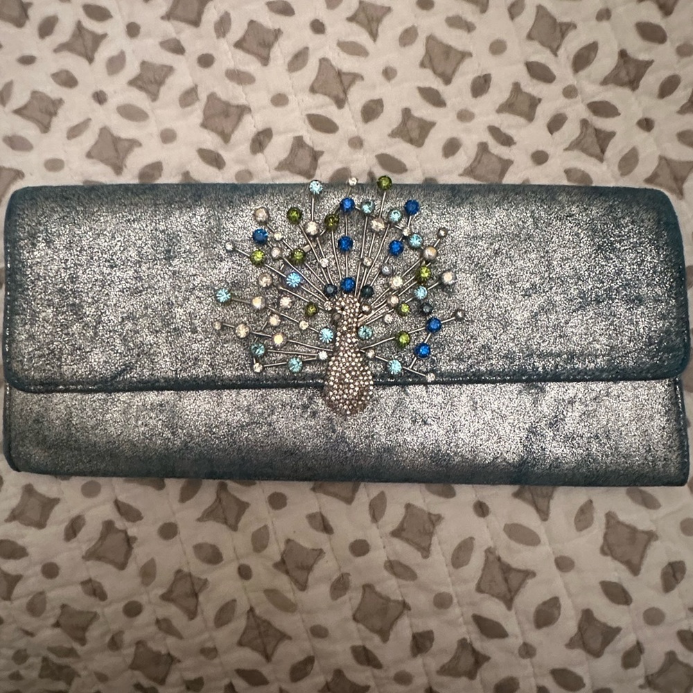 NOIR PEACOCK CLUTCH